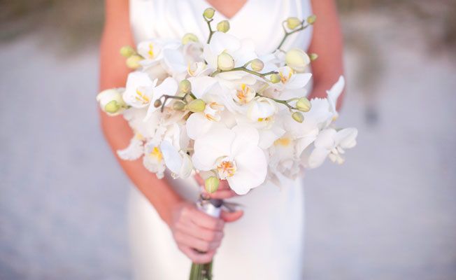 Go Beach-Chic with a Flowy White Gown